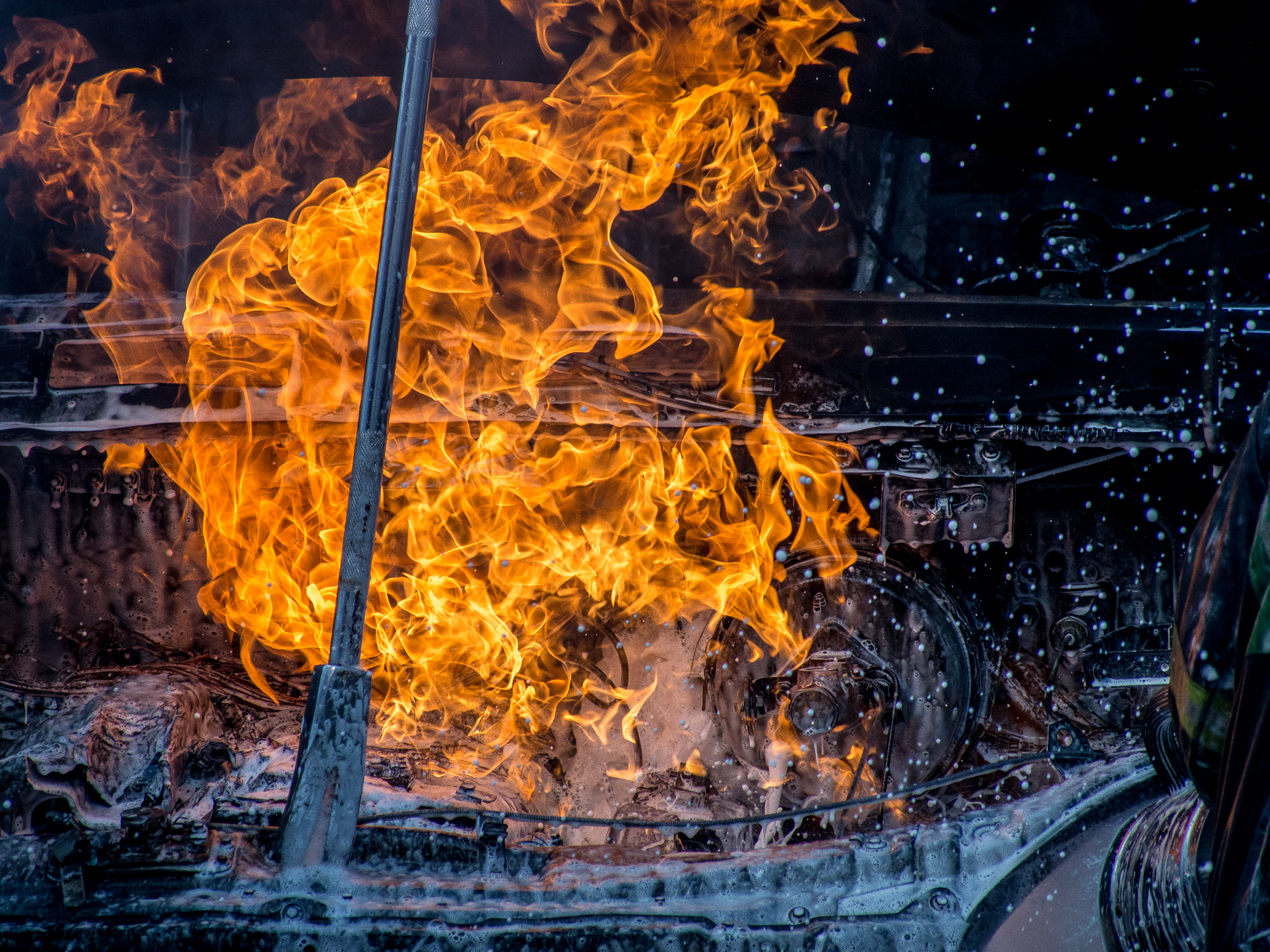Closeup view cowl of the burning car